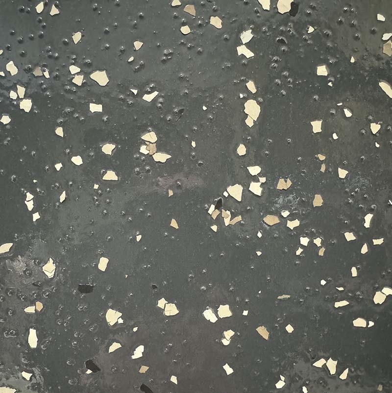 dark grey floor with beige and white flakes - Innovative Garage Flooring partial flake epoxy flooring