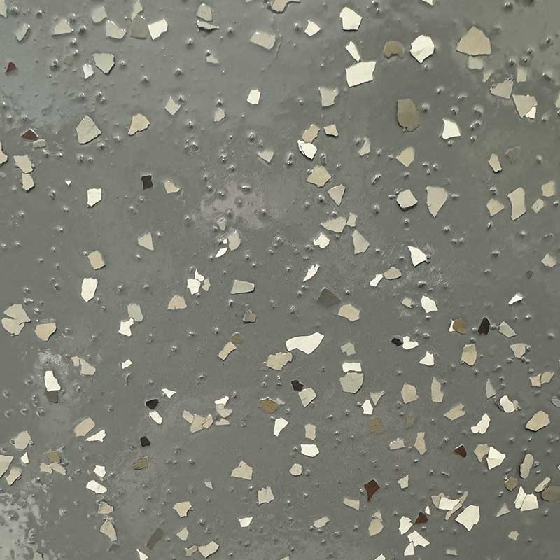 dark grey floor with black and white flakes - Innovative Garage Flooring partial flake epoxy flooring