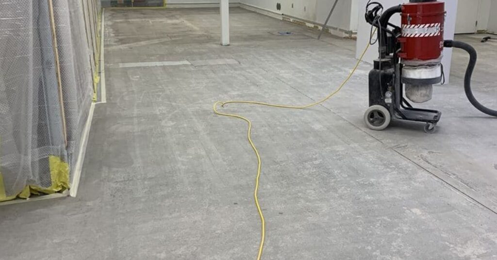 concrete floor being prepped to be polished - Innovative Garage Flooring polished concrete