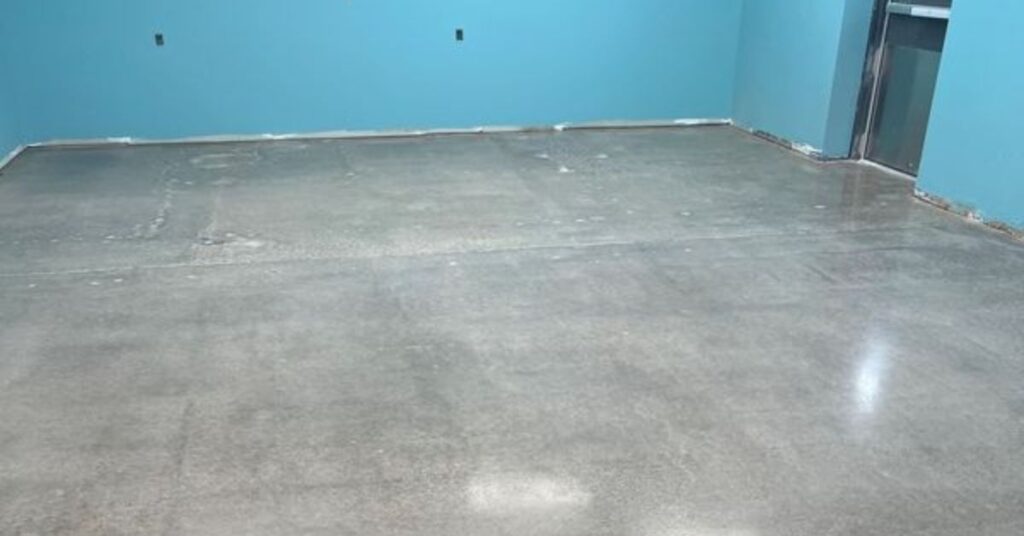 concrete floor being prepped to be polished - Innovative Garage Flooring polished concrete