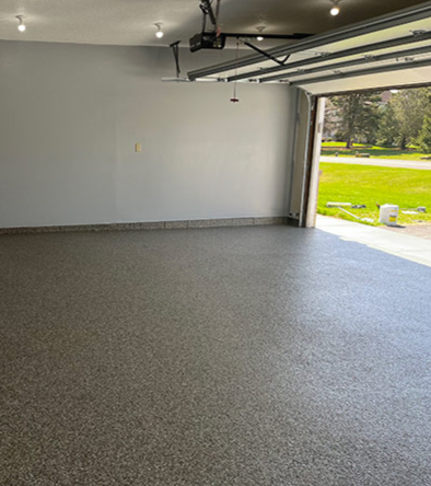 garage with an open door - Innovative Garage Flooring