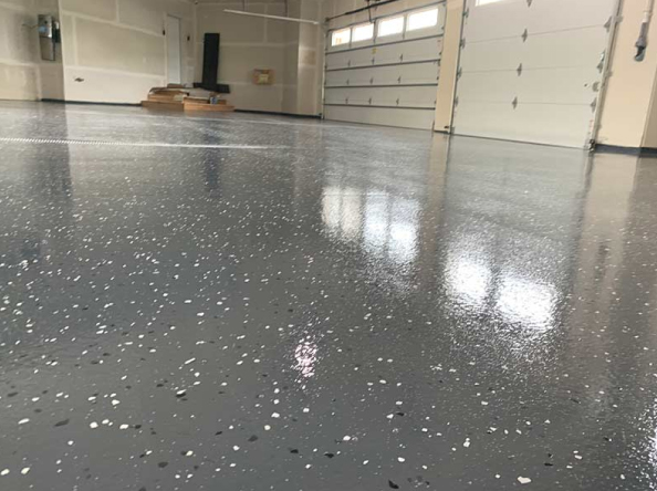 close up of partial flake epoxy floor - Innovative Garage Flooring partial flake epoxy flooring