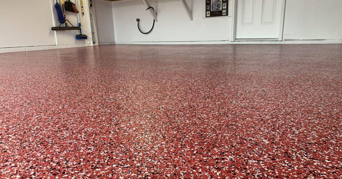 epoxy flooring with a red base and black and white flakes - Innovative Garage Flooring epoxy flooring