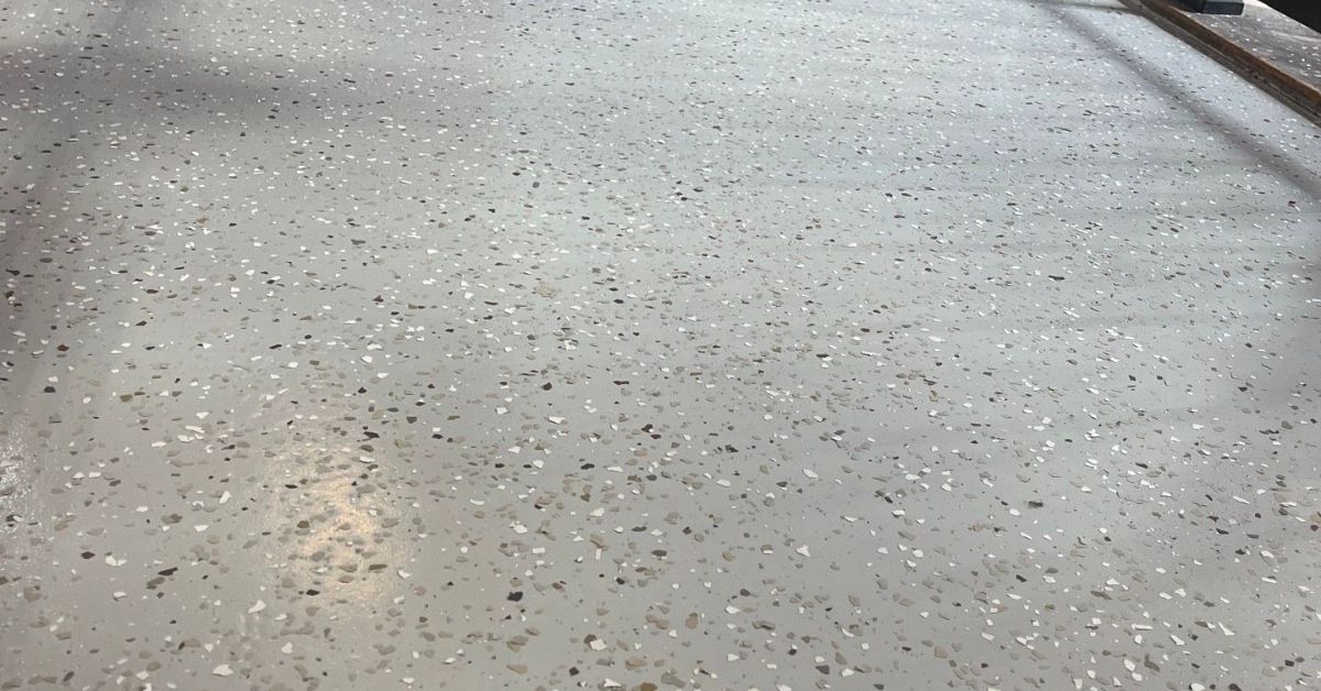 epoxy floor in an unfinished coffee shop - Innovative Garage Flooring epoxy flooring