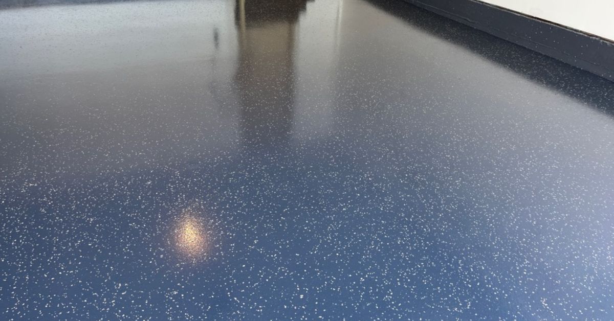 epoxy flooring with a blue base and white flakes - Innovative Garage Flooring epoxy flooring