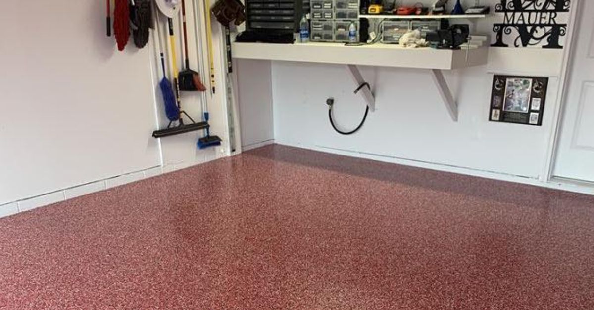 red epoxy floor with white shelves - Innovative Garage Flooring epoxy flooring contractors near