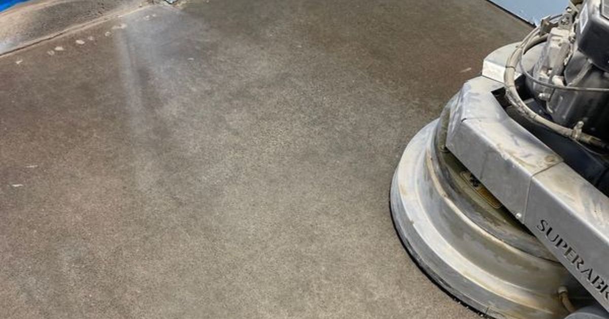 machine buffering a polished concrete floor - Innovative Garage Flooring polished concrete