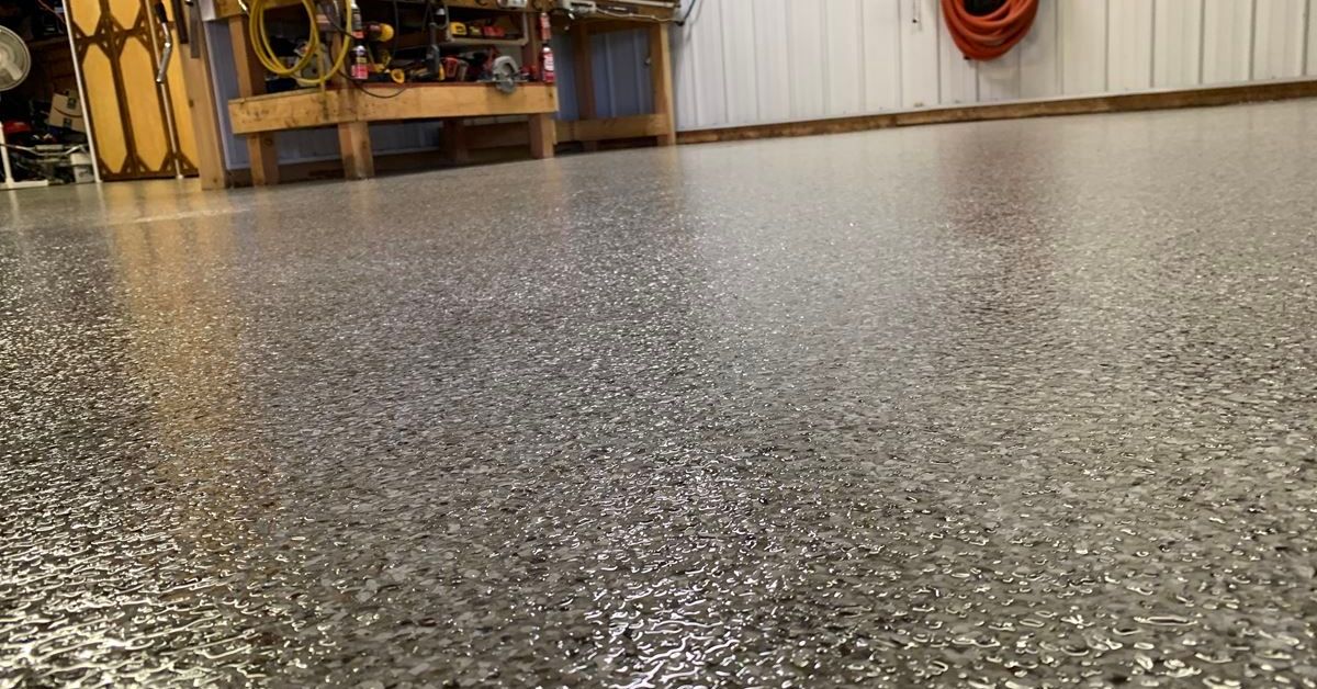 epoxy floor with a wood bench - Innovative Garage Flooring epoxy flooring contractors near