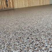 epoxy flooring with a grey base and white flakes - Innovative Garage Flooring epoxy flooring contractor near