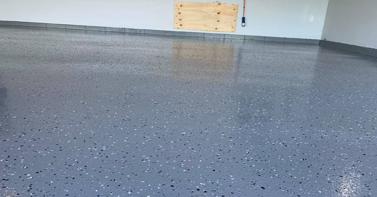 epoxy flooring with a blue base and white flakes - Innovative Garage Flooring epoxy flooring contractor near