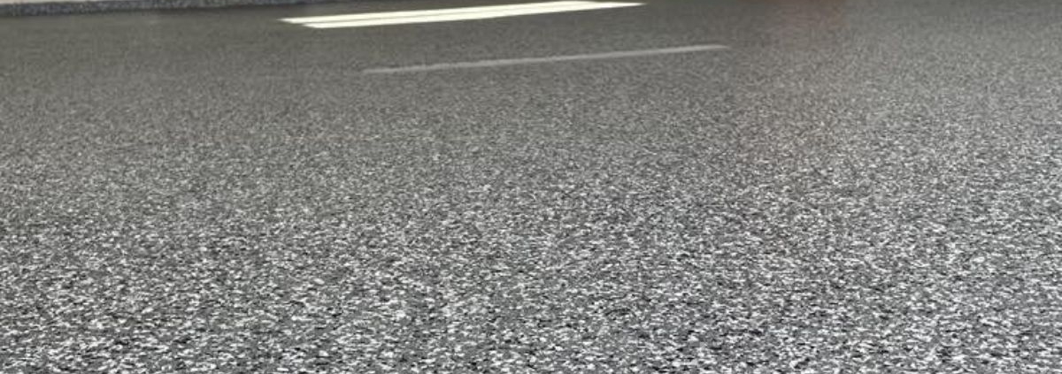 full flake epoxy flooring with blue and white flakes in a residential garage - Innovative Garage Flooring epoxy flooring