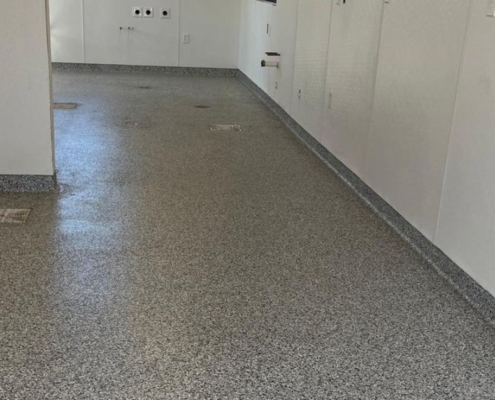 epoxy floor in an unfinished coffee shop - Innovative Garage Flooring epoxy flooring