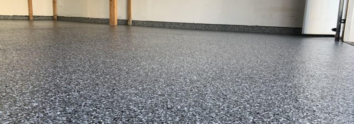 full flake epoxy flooring with a wood bench - Innovative Garage Flooring epoxy flooring contractors near