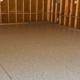 epoxy floor in a garage with wood stud walls - Innovative Garage Flooring epoxy flooring contractors near