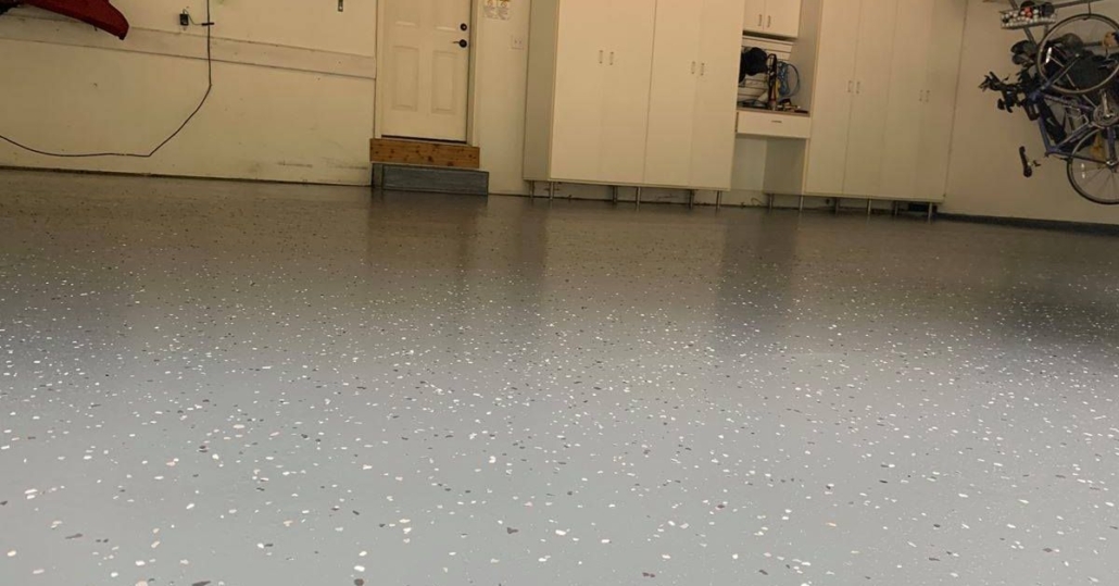 epoxy flooring with a grey base and white flakes - Innovative Garage Flooring epoxy flooring contractor near