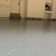 epoxy flooring with a grey base and white flakes - Innovative Garage Flooring epoxy flooring contractor near