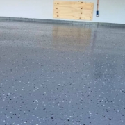 epoxy flooring with a blue base and white flakes - Innovative Garage Flooring epoxy flooring contractor near