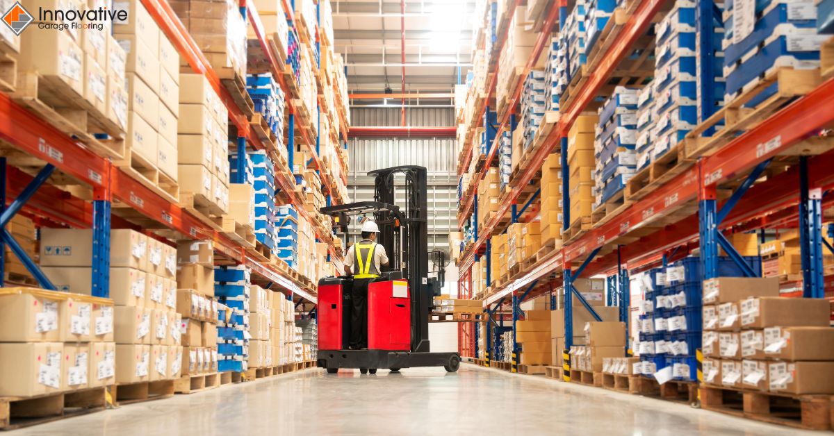 person driving forklift around a warehouse - Innovative Garage Flooring Epoxy Flooring for Industrial & 
Manufacturing Facilities