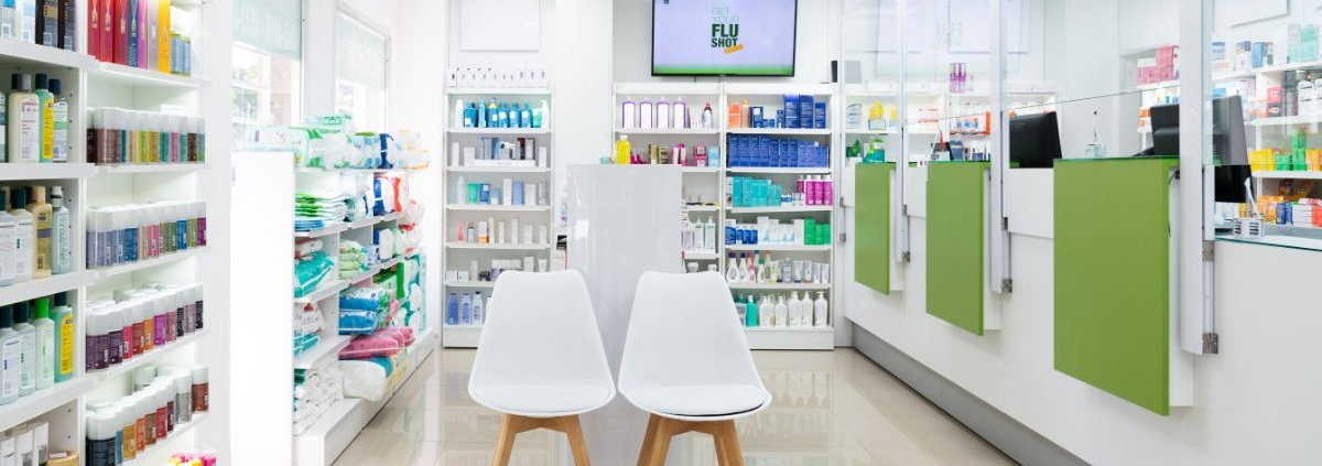 empty pharmacy with shelves of medication - Innovative Garage Flooring epoxy flooring for medical and healthcare facilities