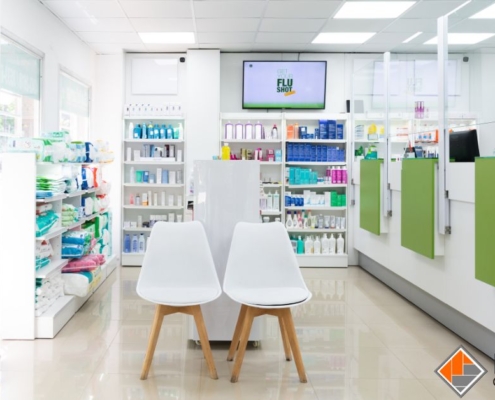 empty pharmacy with shelves of medication - Innovative Garage Flooring epoxy flooring for medical and healthcare facilities