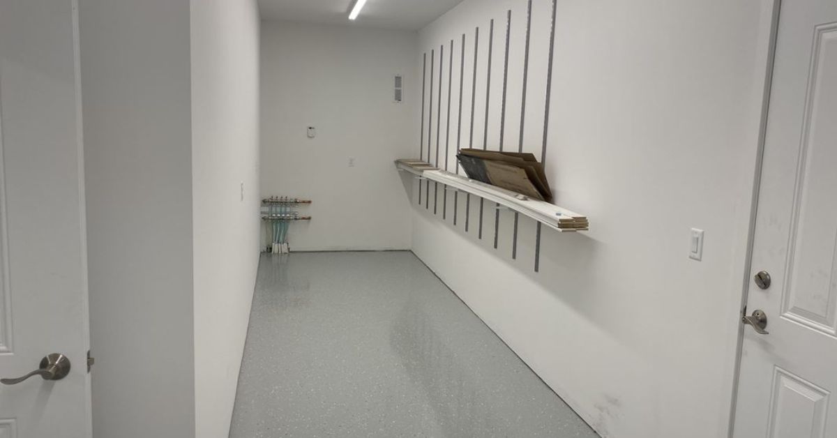 closet with white walls and epoxy flooring - Innovative Garage Flooring commercial epoxy flooring