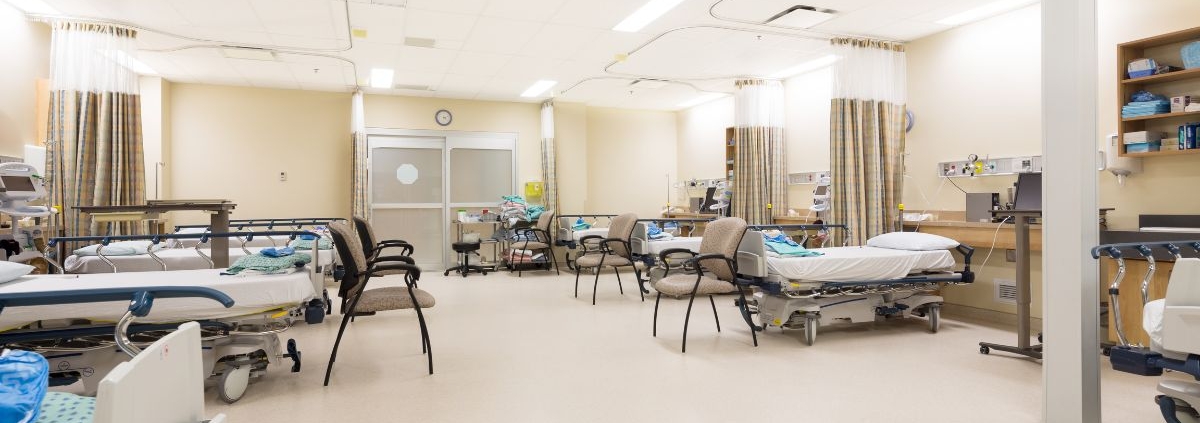 empty hospital beds with chairs - Innovative Garage Flooring epoxy flooring for healthcare and medical-facilities