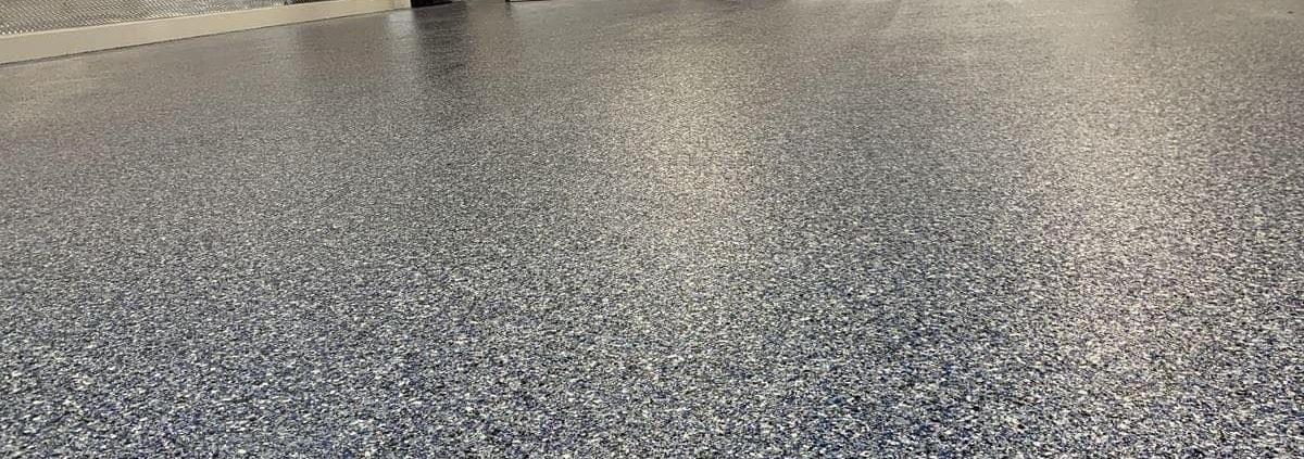 close up of epoxy flooring in a commercial space- Innovative Garage Flooring epoxy flooring