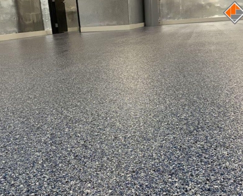 close up of epoxy flooring in a commercial space- Innovative Garage Flooring epoxy flooring