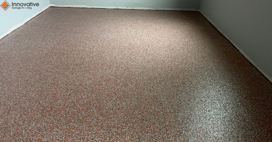 close up of full flake epoxy flooring with grey flakes - Innovative Garage Flooring full flake epoxy flooring