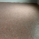 close up of full flake epoxy flooring with grey flakes - Innovative Garage Flooring full flake epoxy flooring